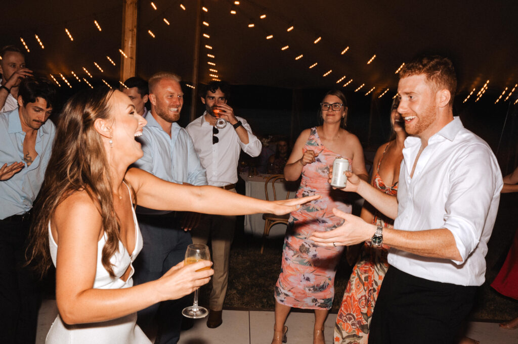 summer garden wedding in the Columbia River Gorge at Wind Mountain Ranch with a Sperry tent, bride and groom dancing