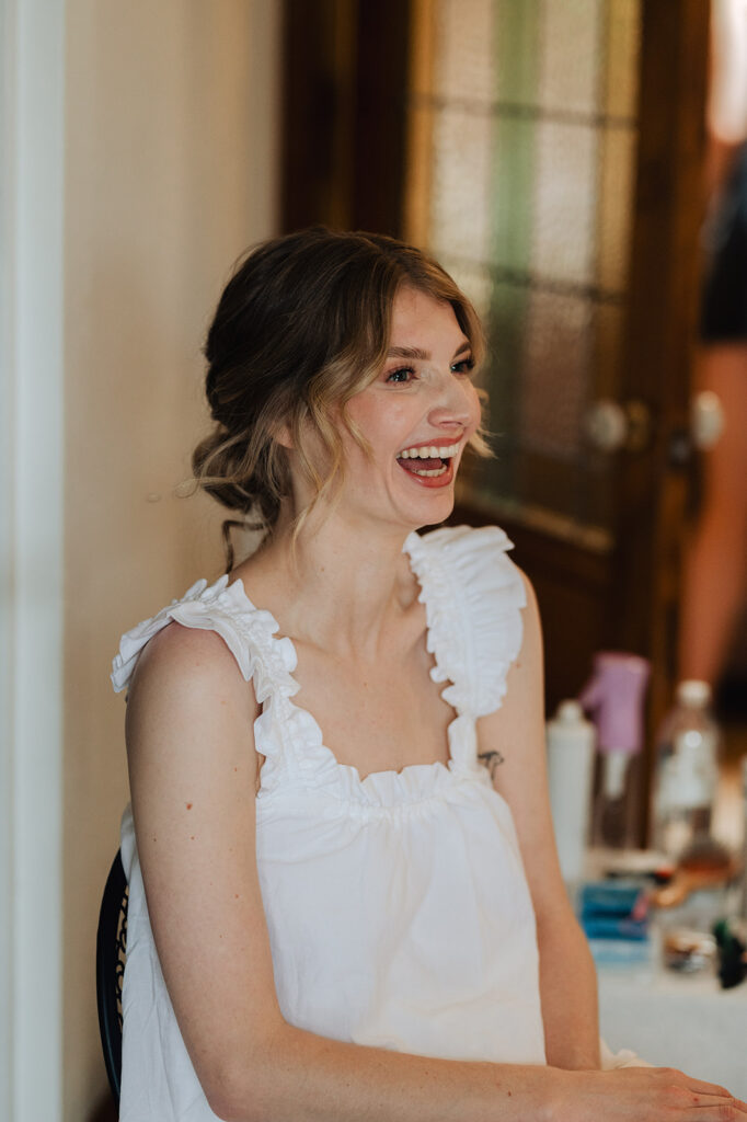 bride getting ready for oregon forest wedding at mount Tom House