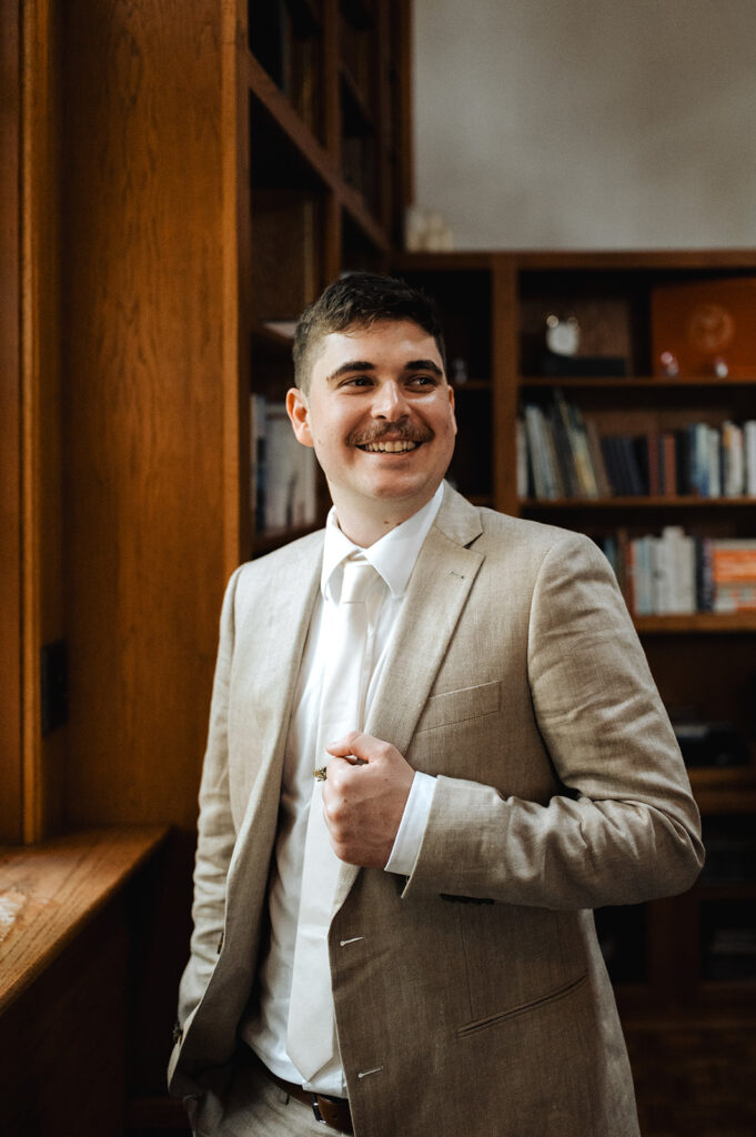 groom getting ready for oregon forest wedding at mount Tom House