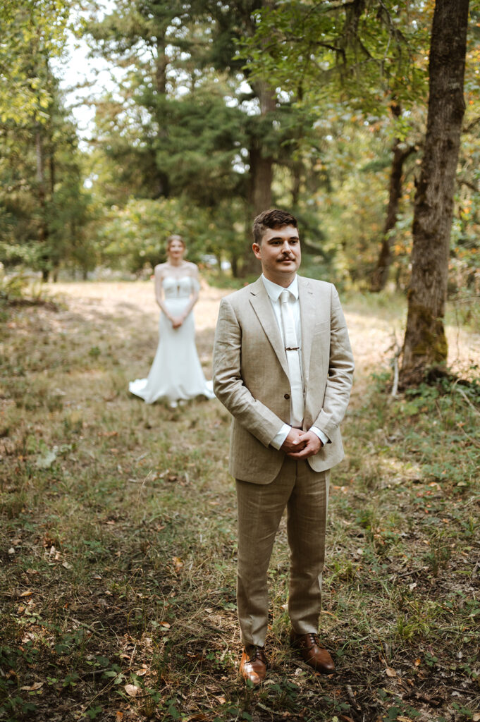 bride and groom first look in forest, wedding at mount Tom House