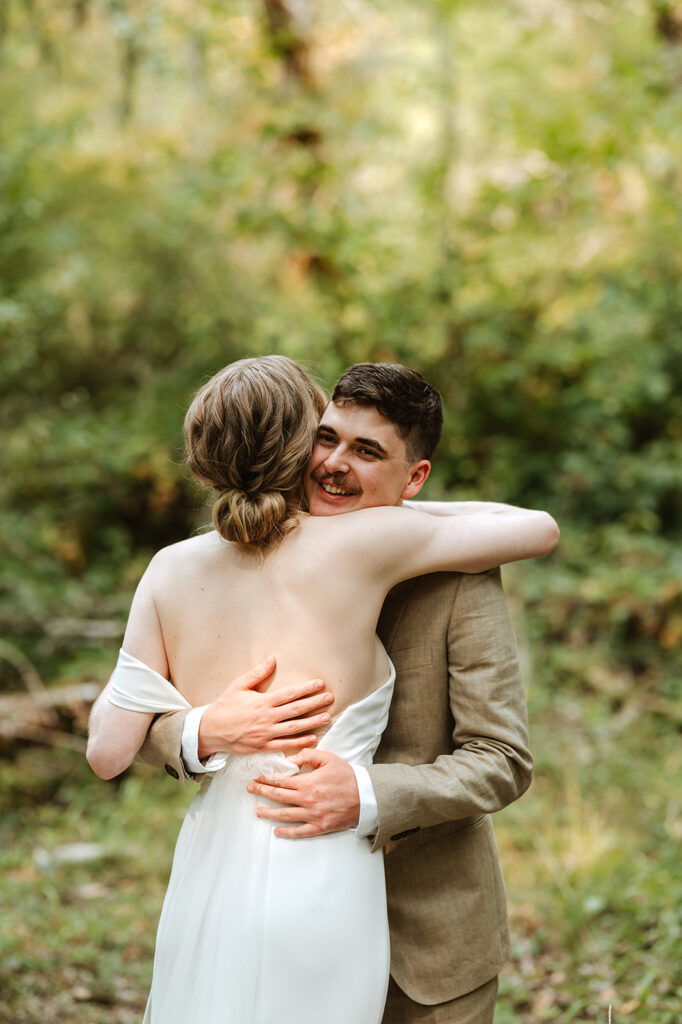 bride and groom first look in forest, wedding at mount Tom House