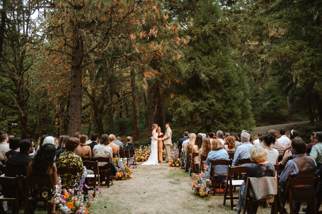 bride and groom at wedding ceremony at oregon forest wedding at mount Tom House